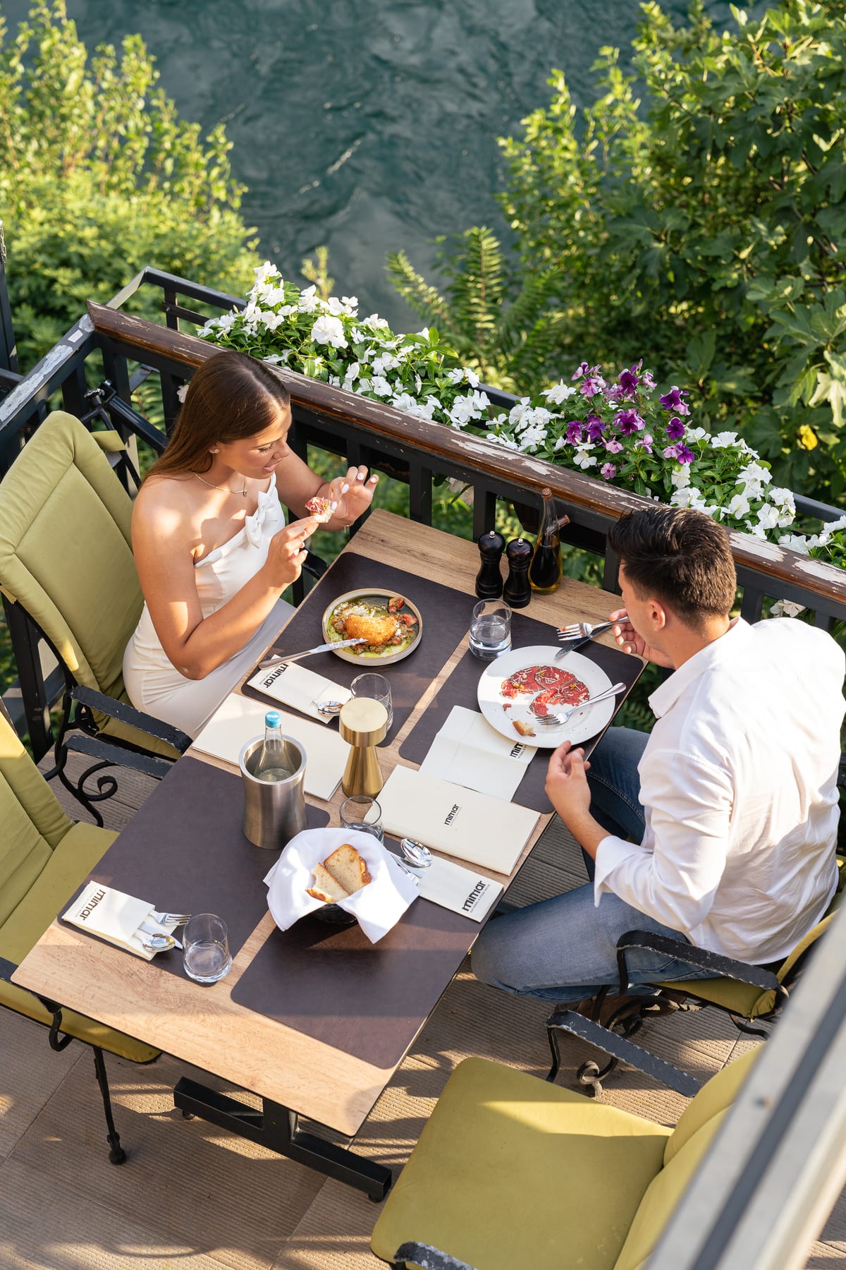 Guests dining on the terrace at Mimar